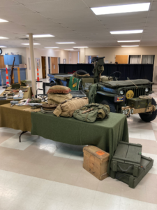 Various items displayed for Military Vehicle Collectors