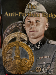 The Cover of The Anti-Partisan Badge by Antonio Scapini
